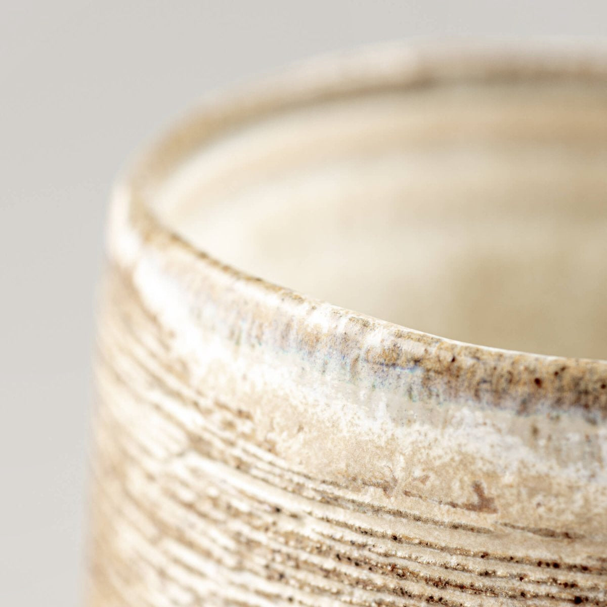 Artisan ceramic mugs with unique carvings, fine dining tableware and handmade décor essentials.
