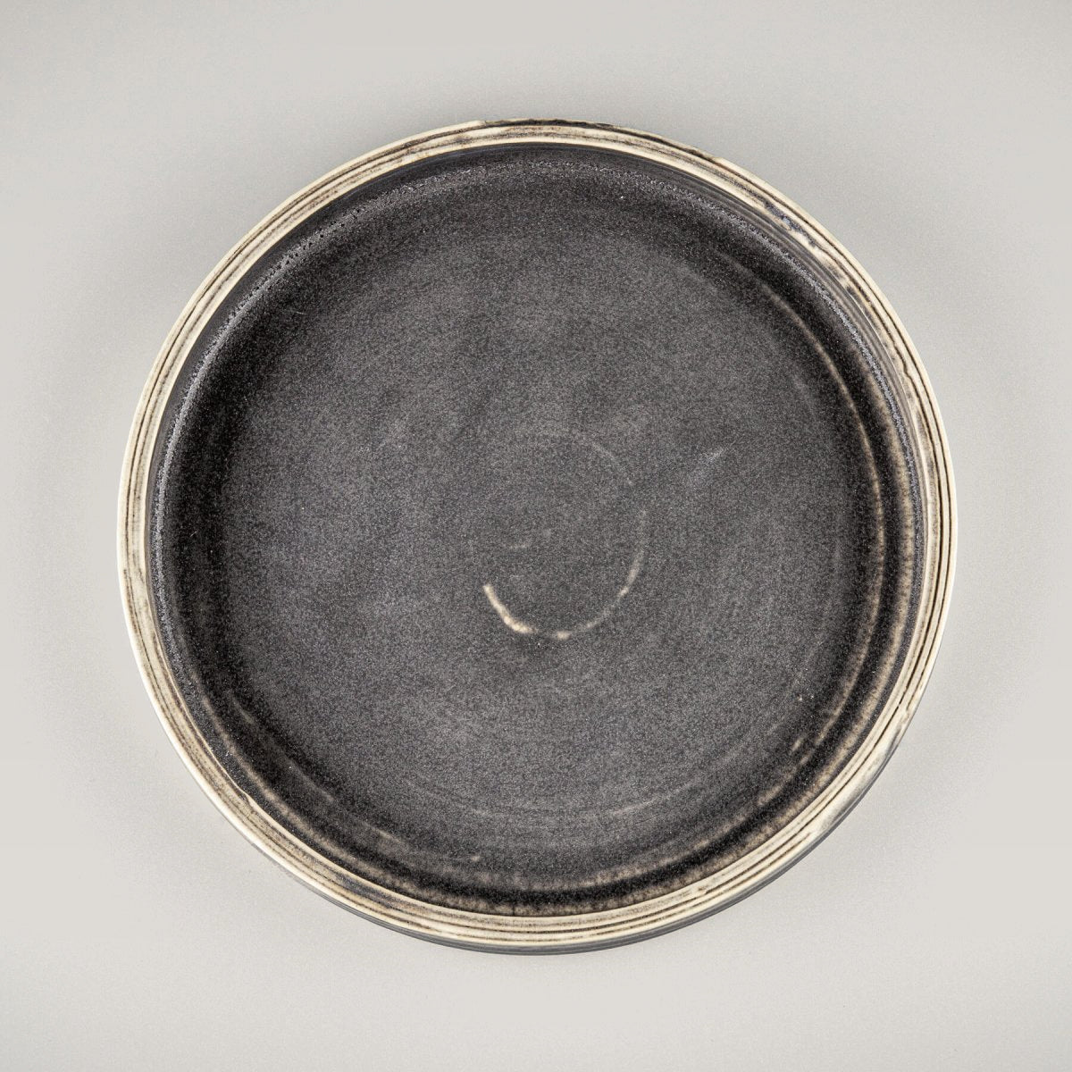 Elegant handmade ceramic plate with straight edges and flat base, ideal for fine dining and luxury restaurant plating.