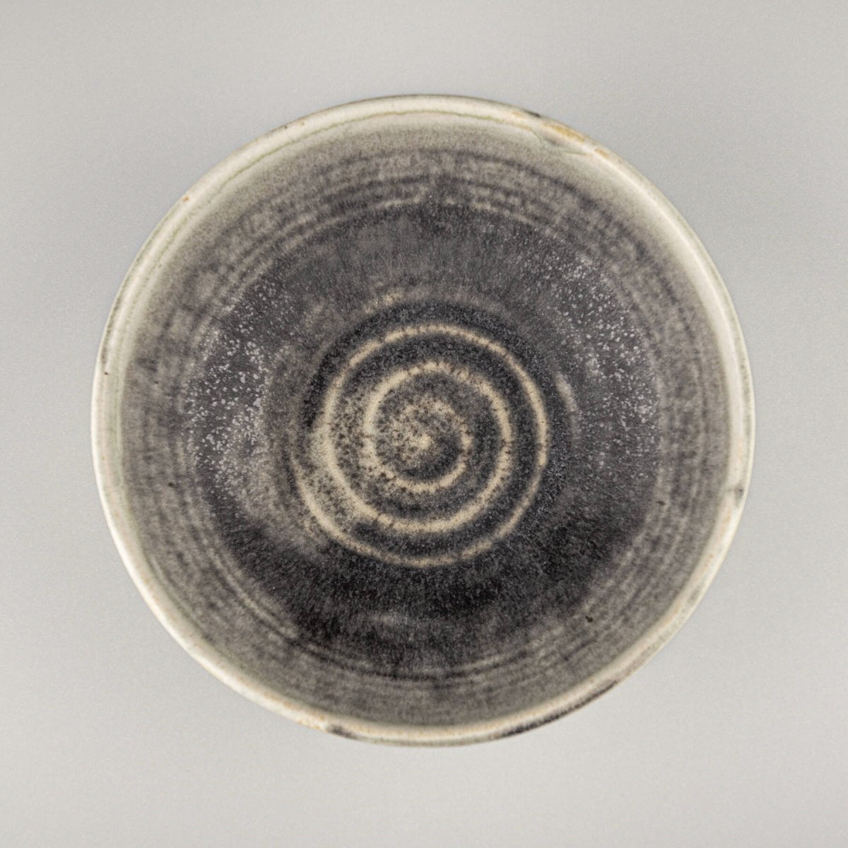Elegant handmade ceramic bowl with tactile finish, ideal for tableware, home decor, or restaurant serving presentation.