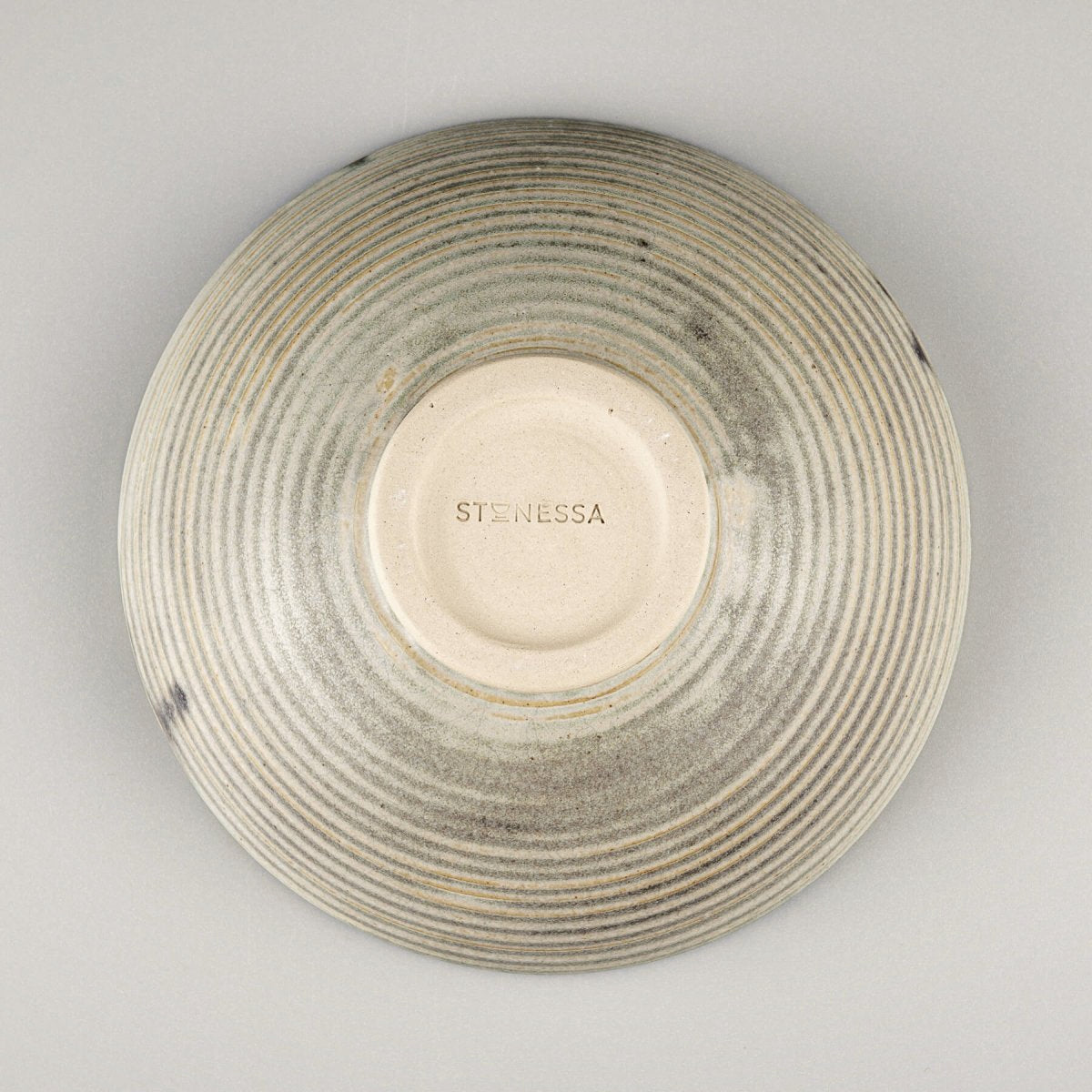 Functional yet decorative ceramic bowl with balanced form and artisanal detailing for modern culinary use.