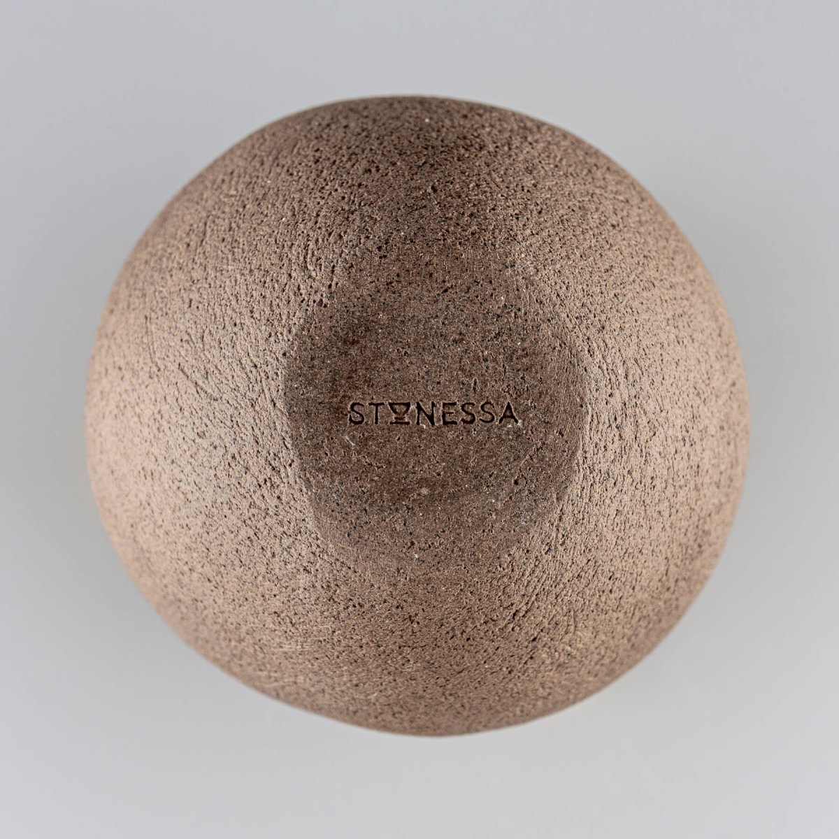Handcrafted stoneware vase, featuring a natural brown clay finish, ideal for home and hotel decor.