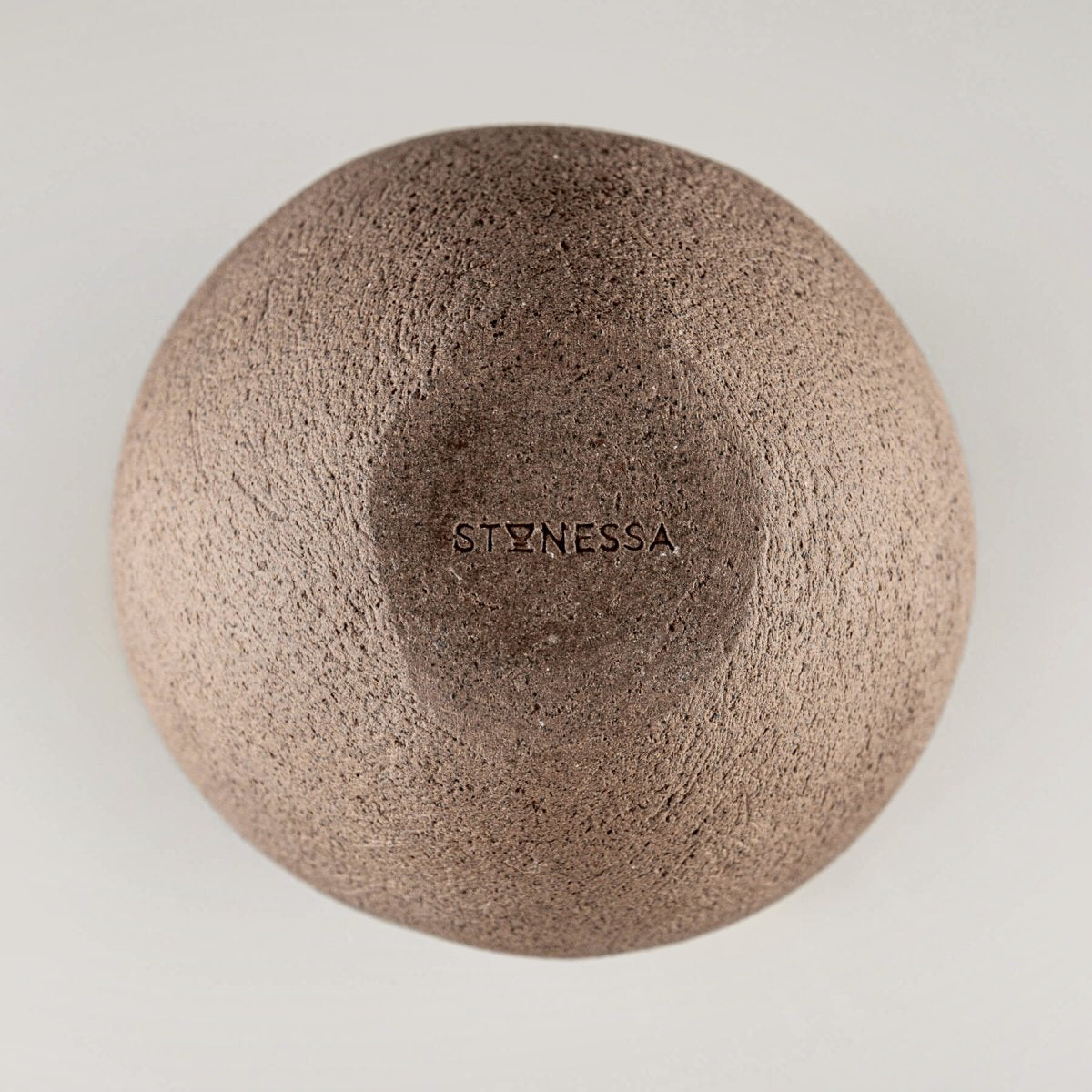 Handcrafted stoneware vase, featuring a natural brown clay finish, ideal for home and hotel decor.