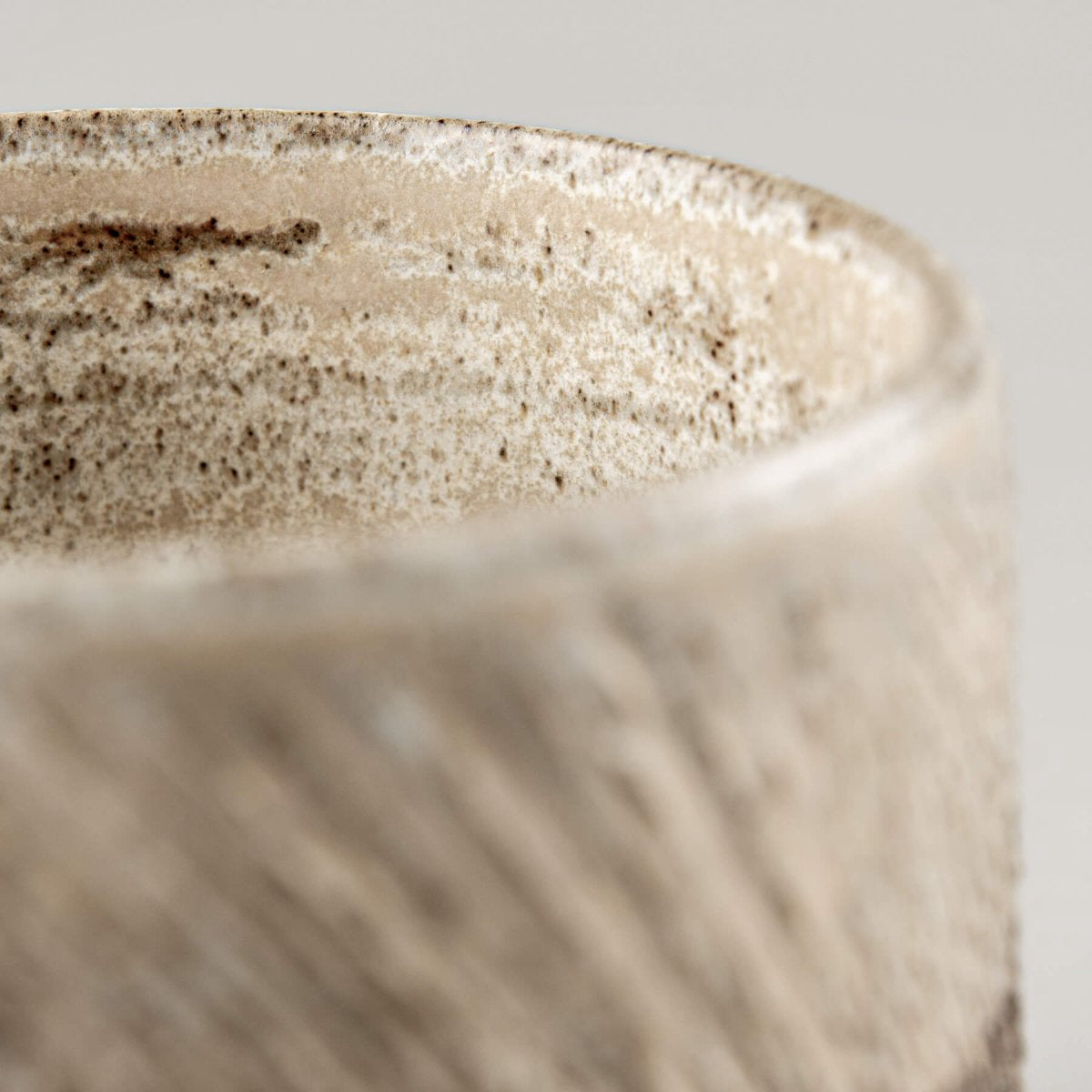 Artisan pottery coffee mugs with rustic carved finish, ideal for collectible pottery and tableware.