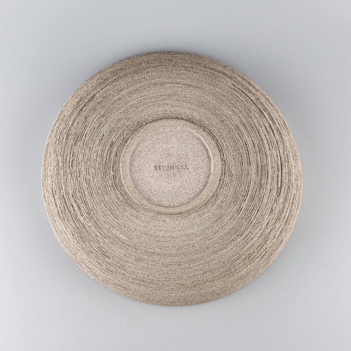 Flat-lay photo of ceramic bowl highlighting inner glaze and symmetrical design perfect for modern kitchens.