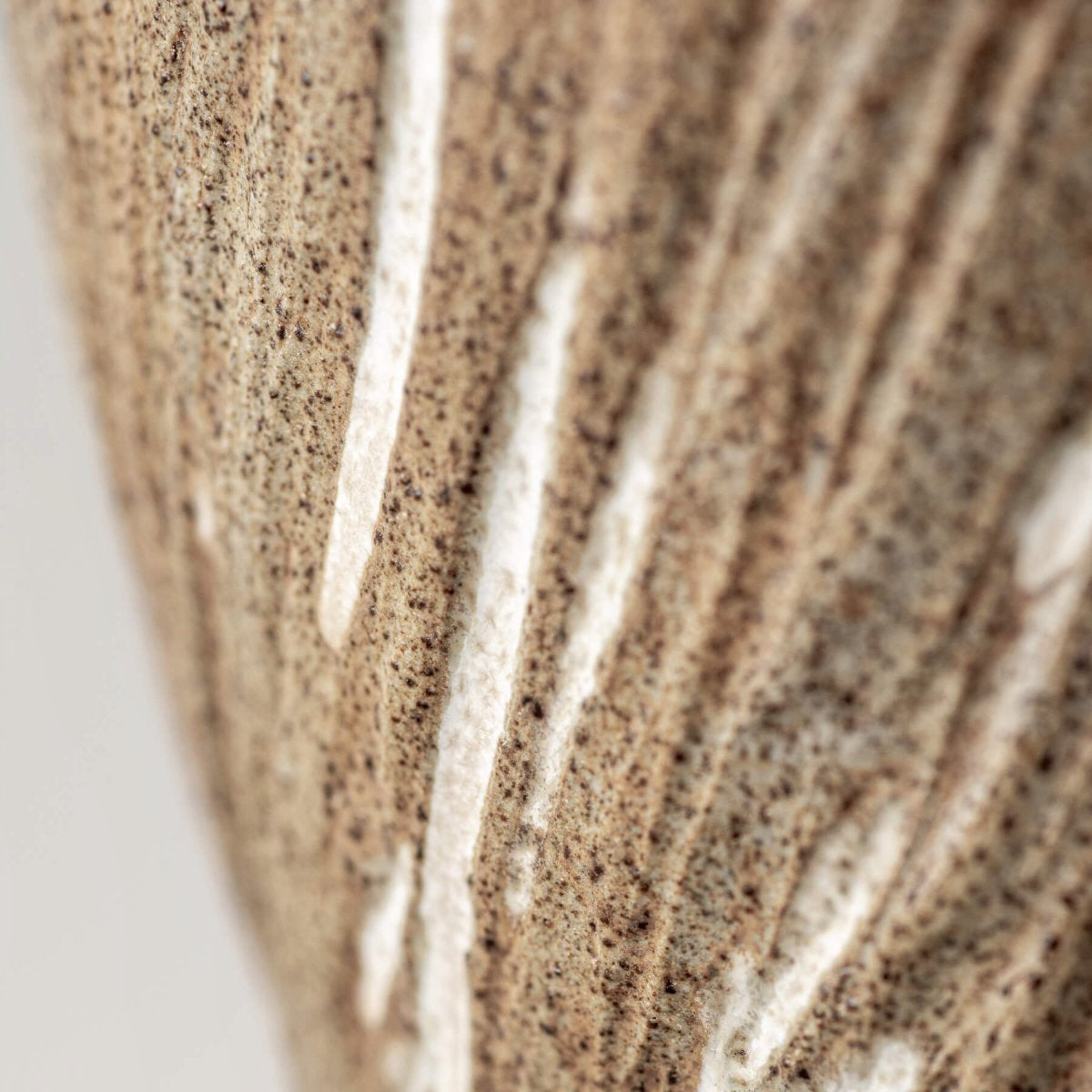 Artisanal ceramic espresso mug with natural clay texture and handmade glaze.
