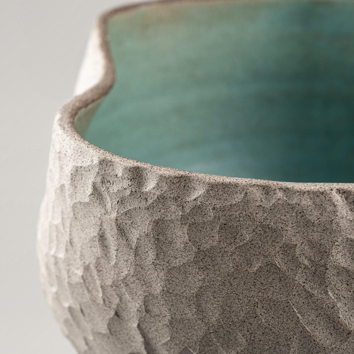 Handcrafted ceramic vases centerpiece with natural stoneware finish and artistic turquoise glaze.
