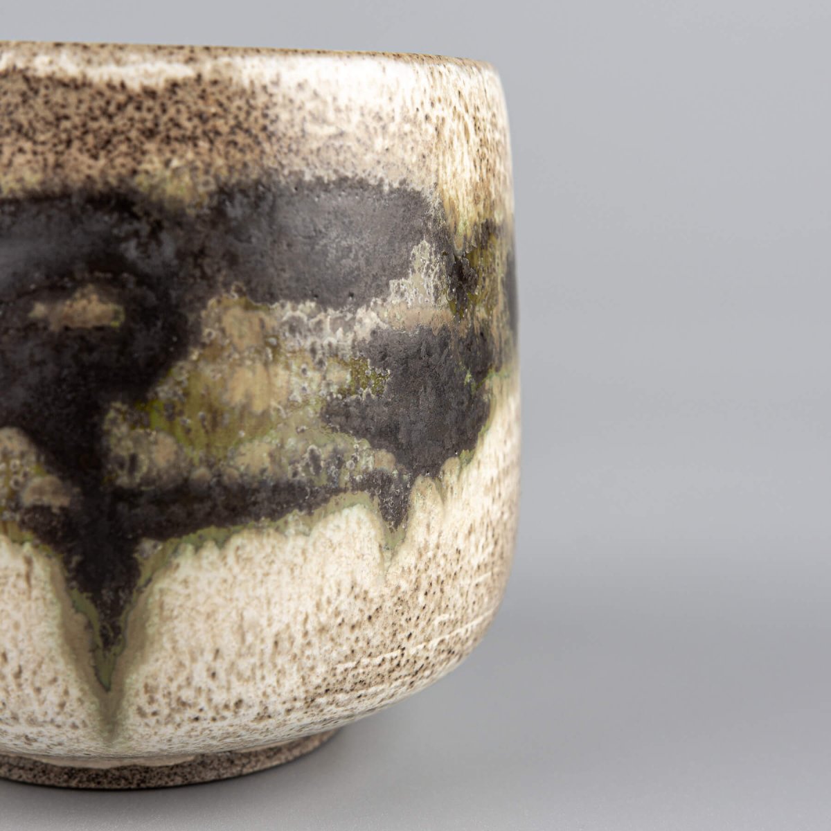 Handcrafted stoneware mugs blending rustic charm and modern design for gifting.