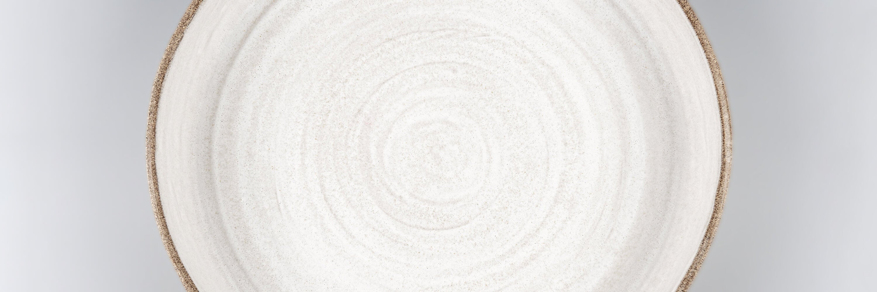 Handmade ceramic platters and luxury stoneware serving trays crafted for fine dining, artistic presentation, and modern interiors by Stonessa.