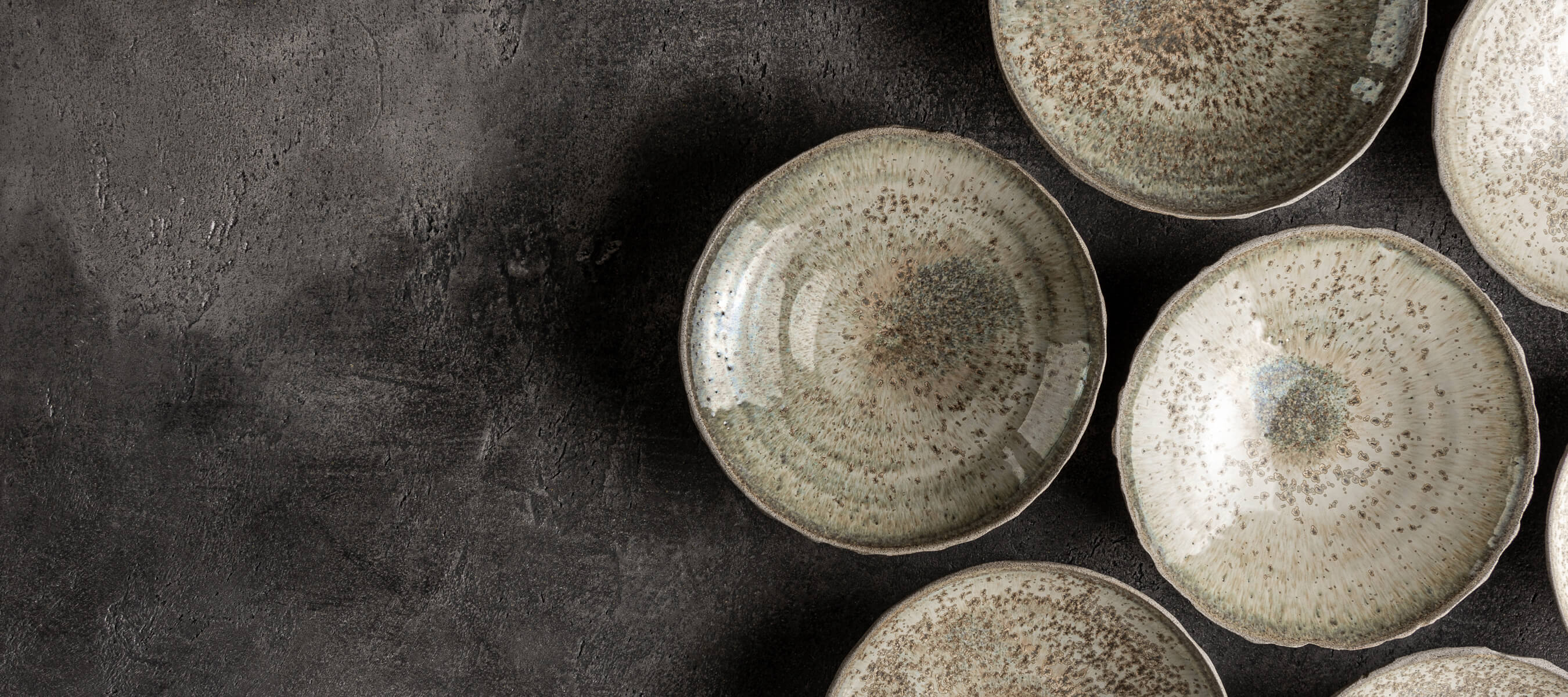 Stonessa luxury handmade ceramics and tableware for fine dining restaurants, modern homes, and collectors worldwide – crafted by artist Svetlana Savcic in Europe.