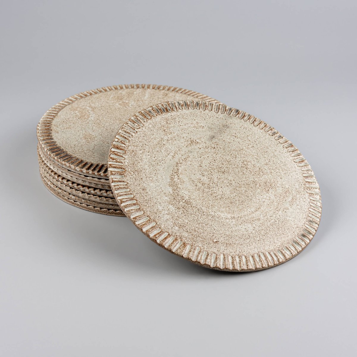 Two handcrafted ceramic plates for boutique hotels and culinary presentation.