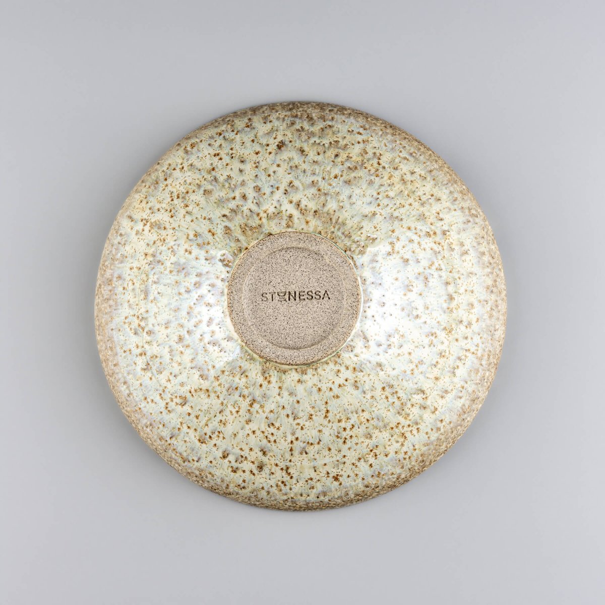 Handmade ceramic bowls with matching finishes, ideal for artisan tableware sets with Stonessa logo.