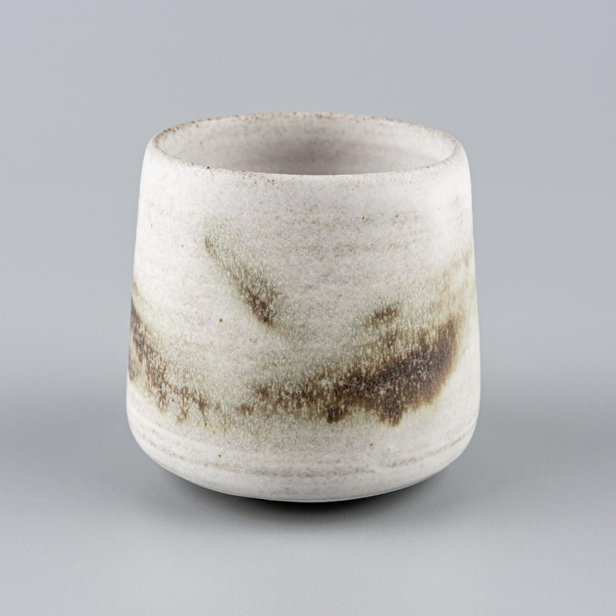 Artisan espresso cup with beveled bottom, luxury tableware for restaurants, hotels, and interior design collectors.