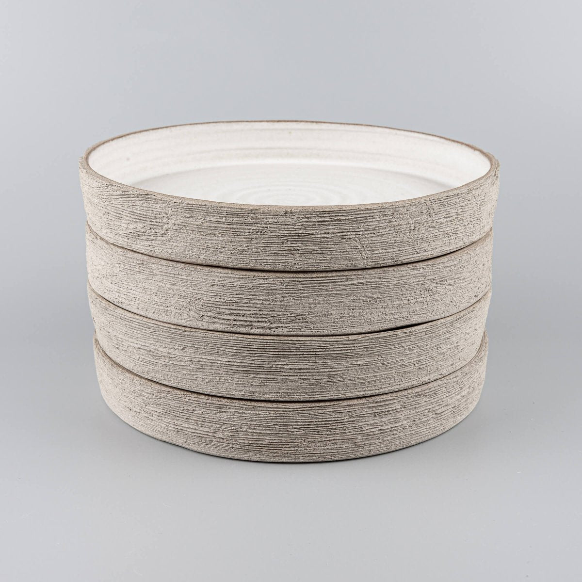Luxury artisan stoneware plates for boutique hotel and fine dining restaurants.
