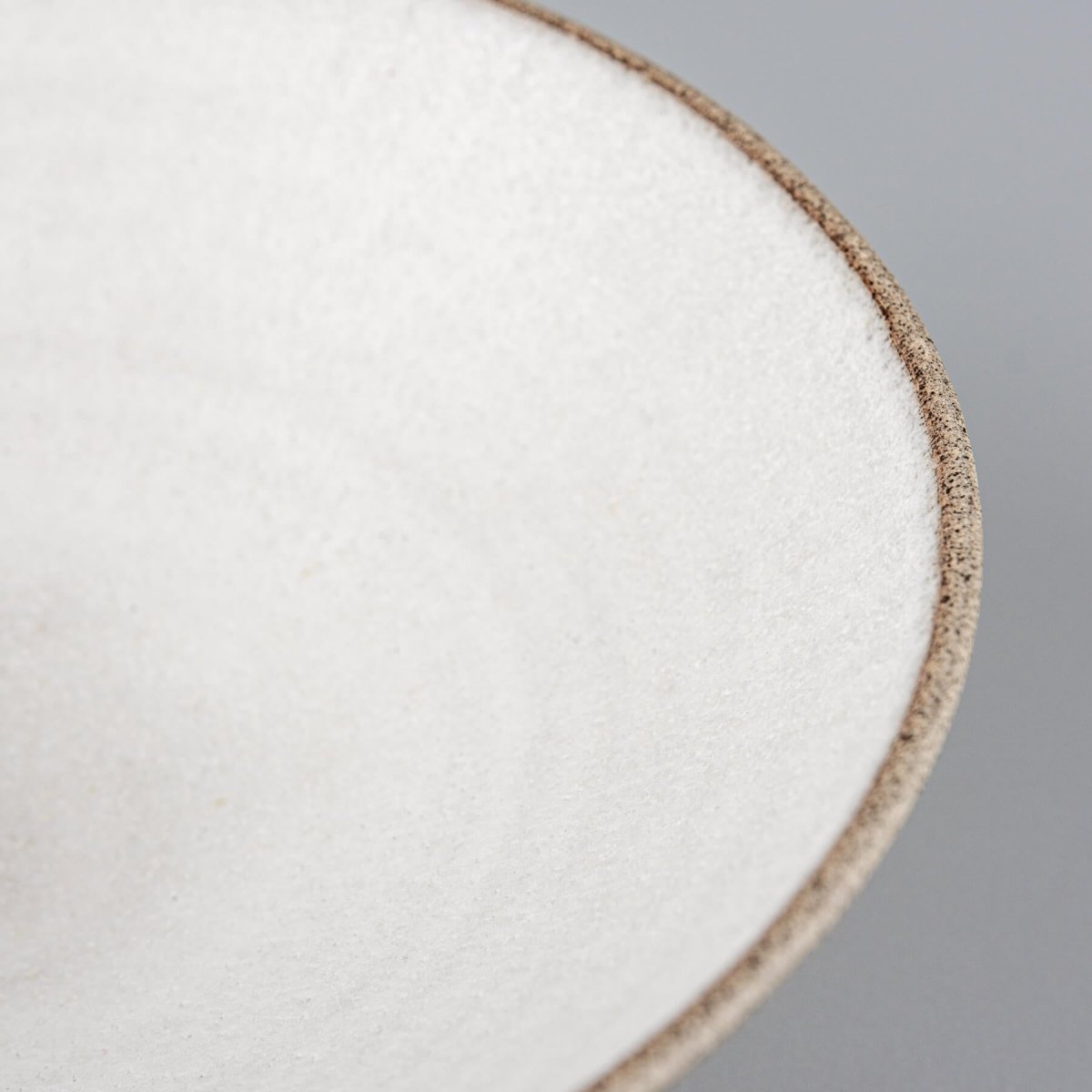 Close-up of rim showcasing craftsmanship and glaze transition in handcrafted bowl.
