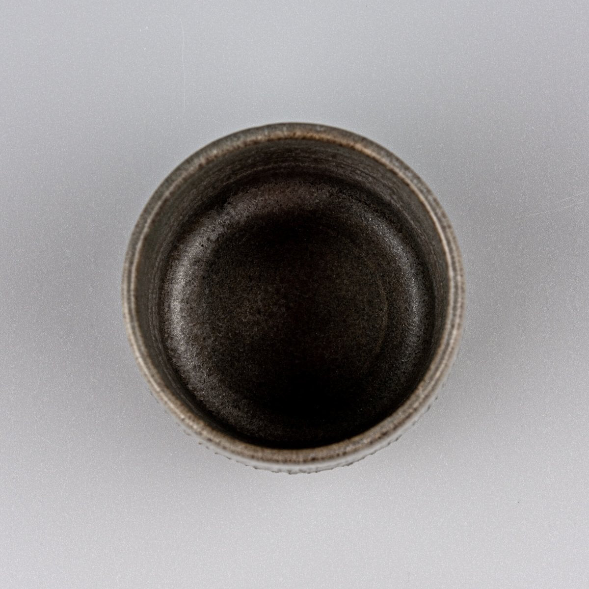 Rustic ceramic coffee cups with matte glaze finish, crafted for boutique hotel dining and stylish home tableware.