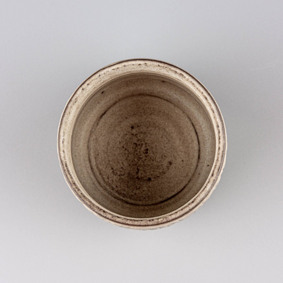 Top view of a handcrafted ceramic mug showing smooth interior and matte glaze finish.