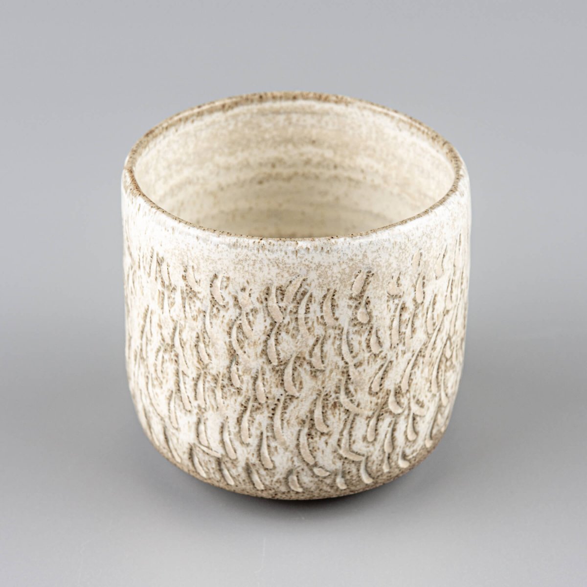 Interior view of a handmade ceramic espresso cup with natural matte glaze.