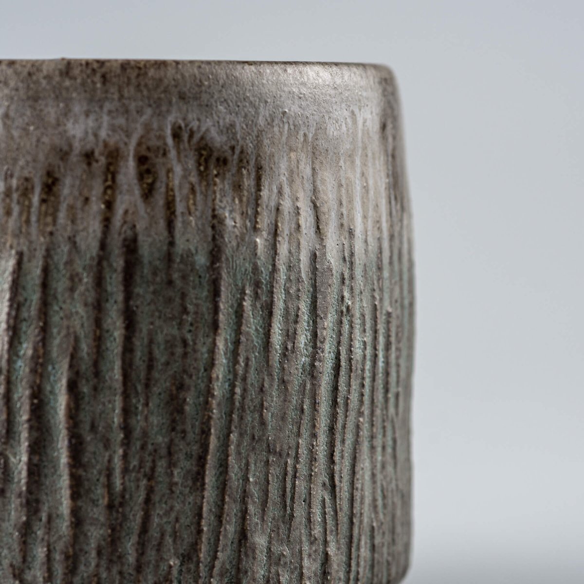 Handcrafted ceramic coffee cups with carved exterior, durable kitchenware and stylish pottery tableware.