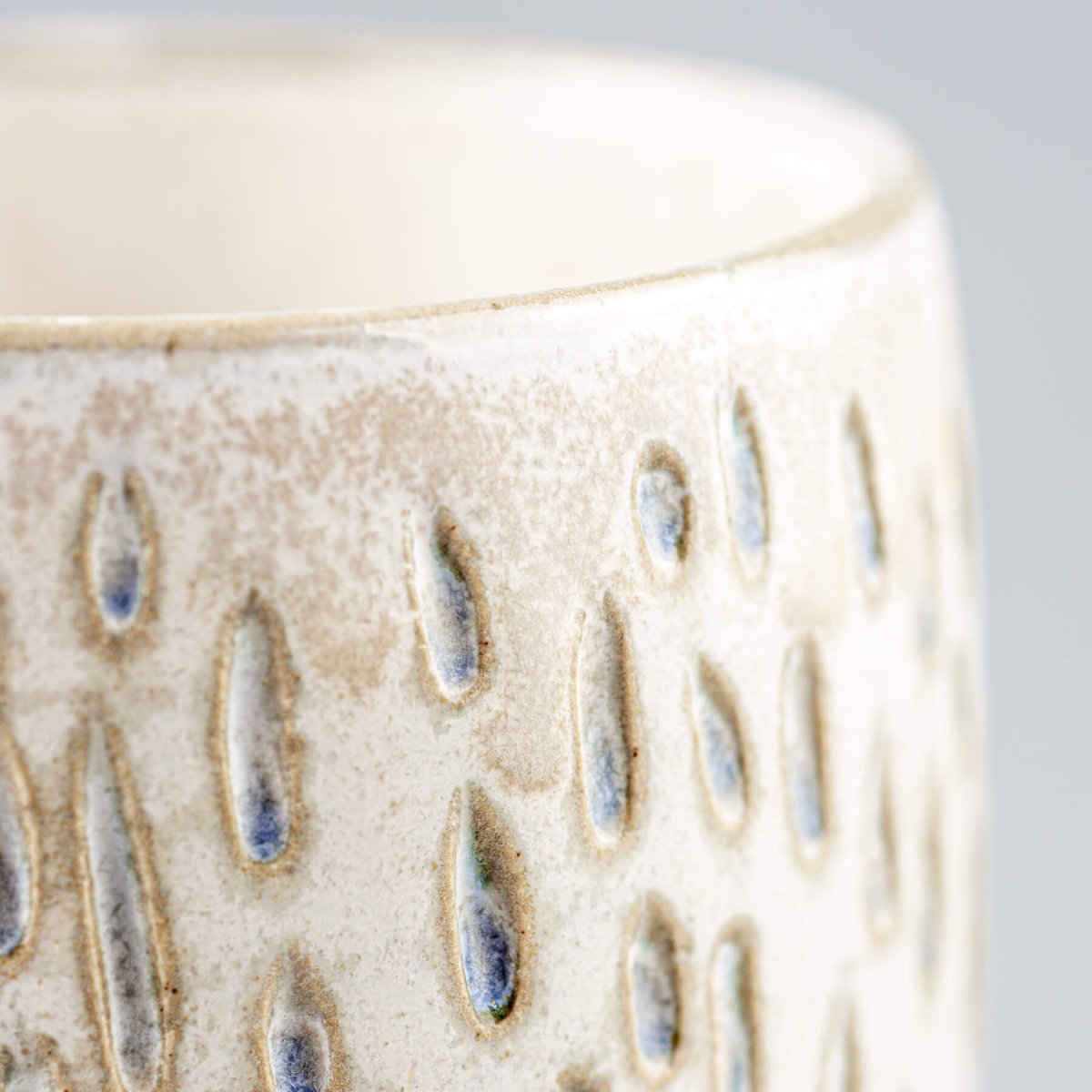 Handmade ceramic espresso cup base showcasing authentic pottery craftsmanship.