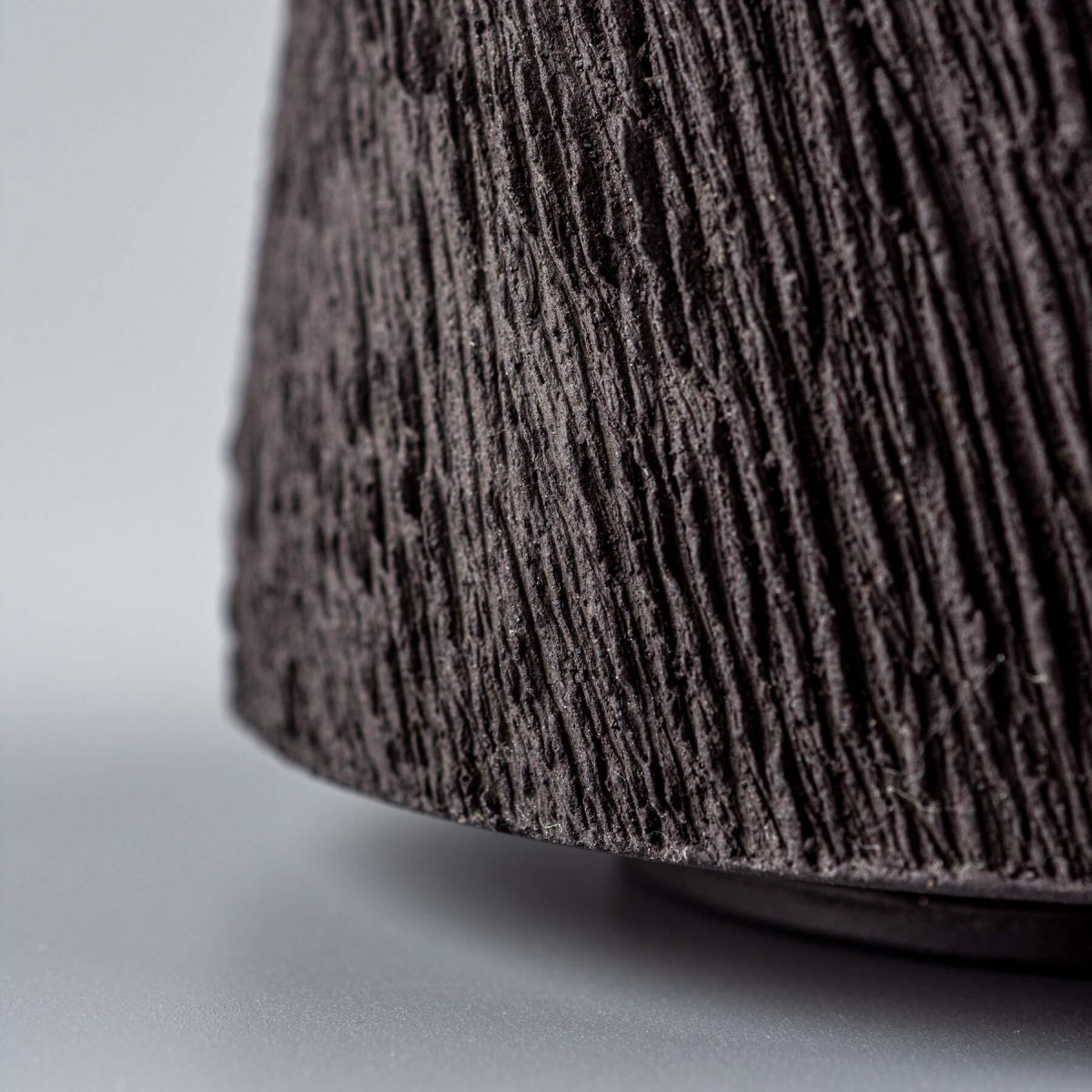 Detailed pottery mug carved texture in black stoneware, ideal for fine dining and collectible handmade ceramics.