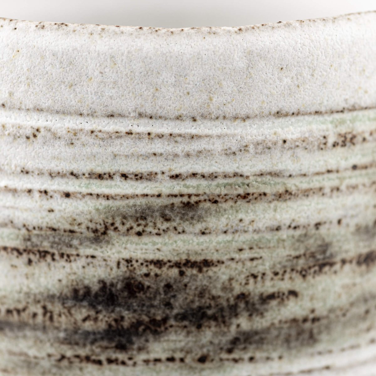 Elegant ceramic mugs for coffee and tea, suitable for home or fine dining use.