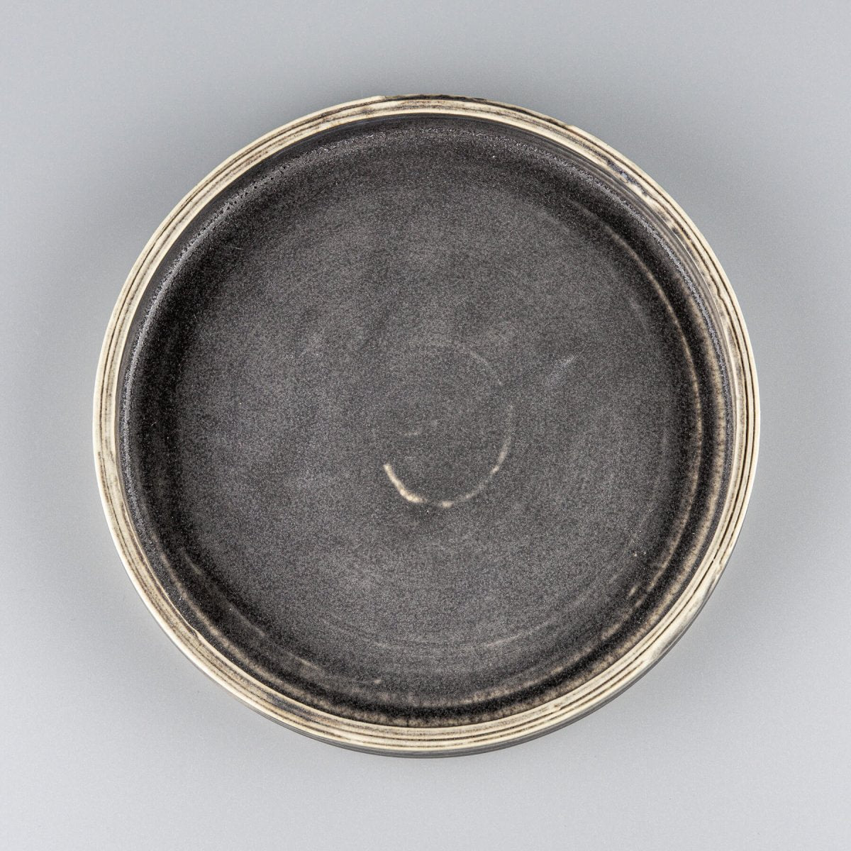 Elegant handmade ceramic plate with straight edges and flat base, ideal for fine dining and luxury restaurant plating.