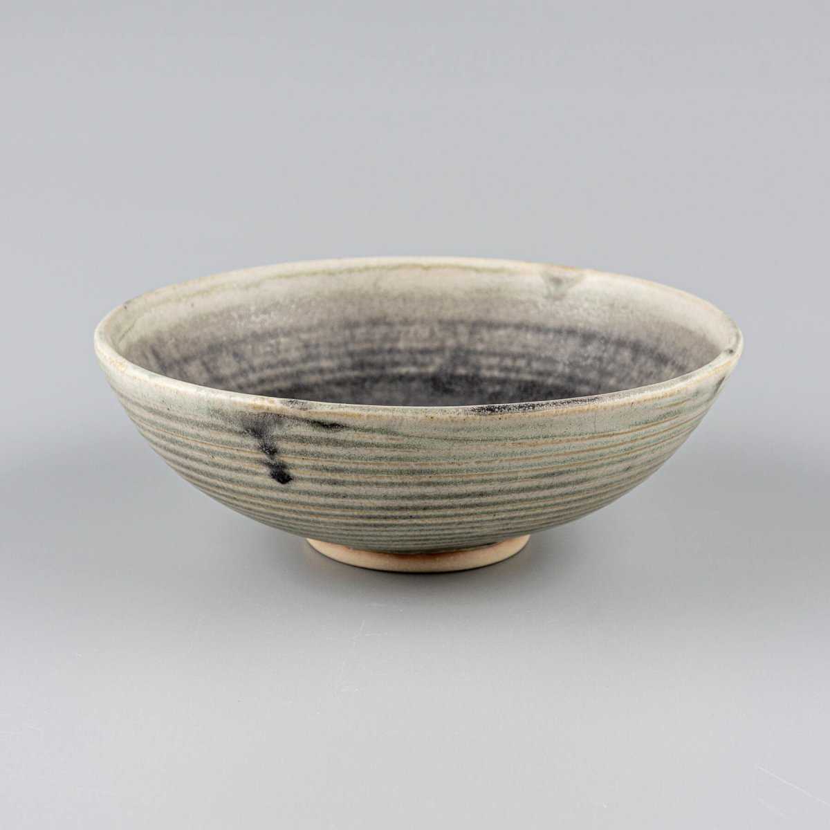 Interior design ceramic bowl with smooth glaze and raw exterior, perfect as handmade decor or wedding gift idea.