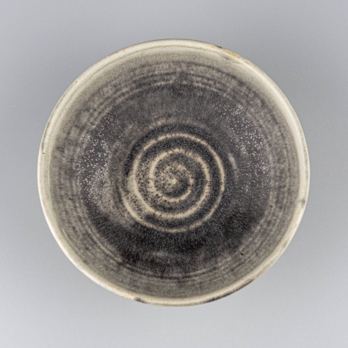Elegant handmade ceramic bowl with tactile finish, ideal for tableware, home decor, or restaurant serving presentation.