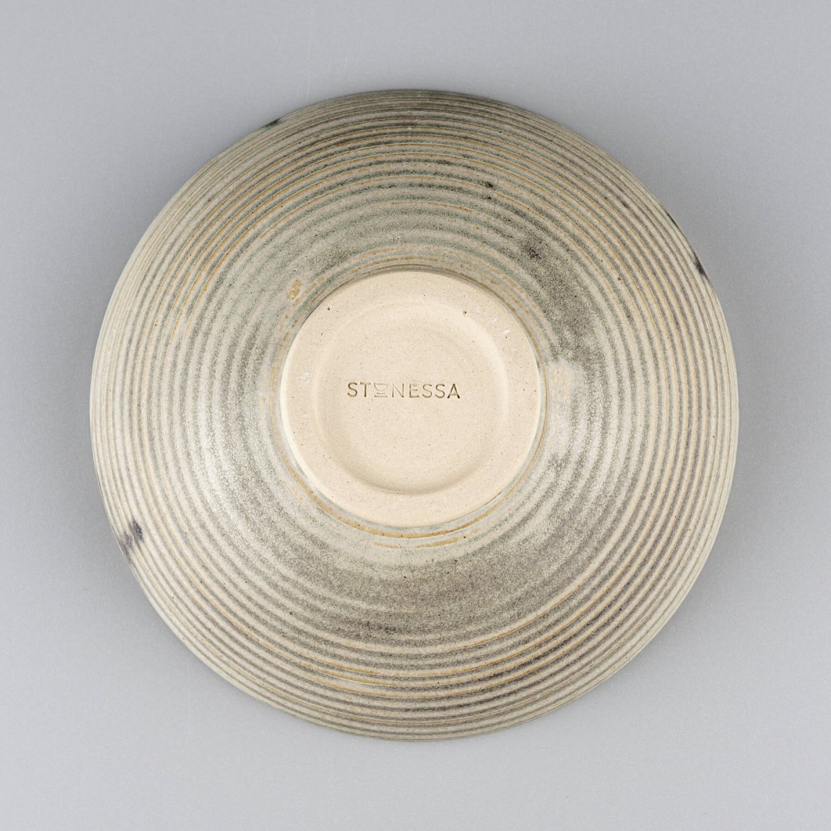 Functional yet decorative ceramic bowl with balanced form and artisanal detailing for modern culinary use.