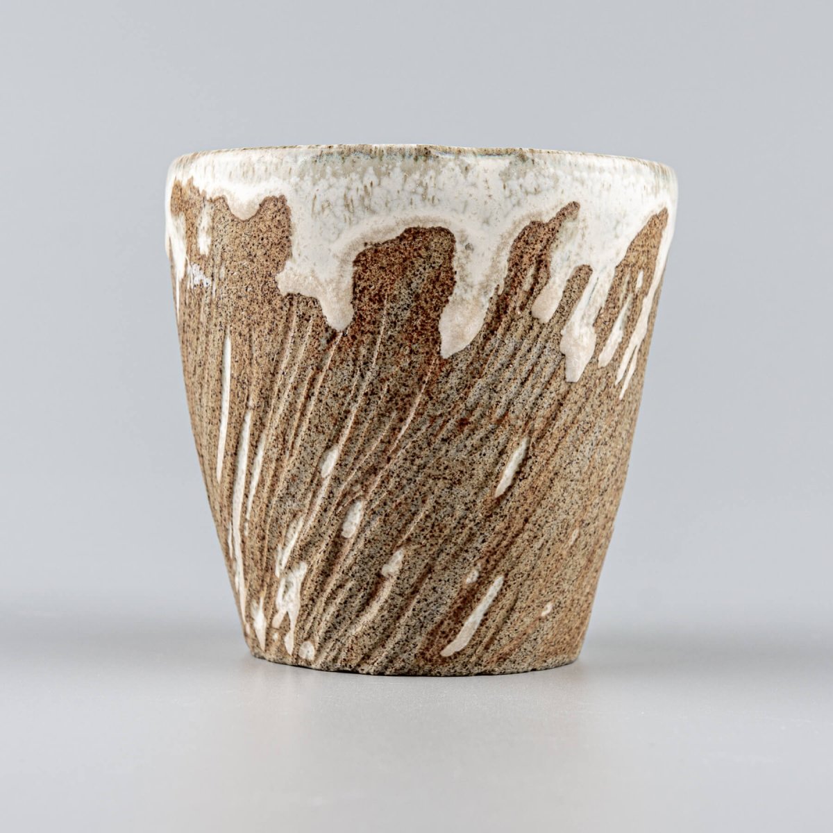 Handmade ceramic espresso mugs with rustic stoneware clay and white semi-gloss glaze.
