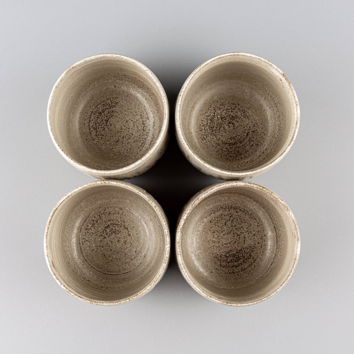 Top view of ceramic handmade cups showcasing interior matte glaze finish.