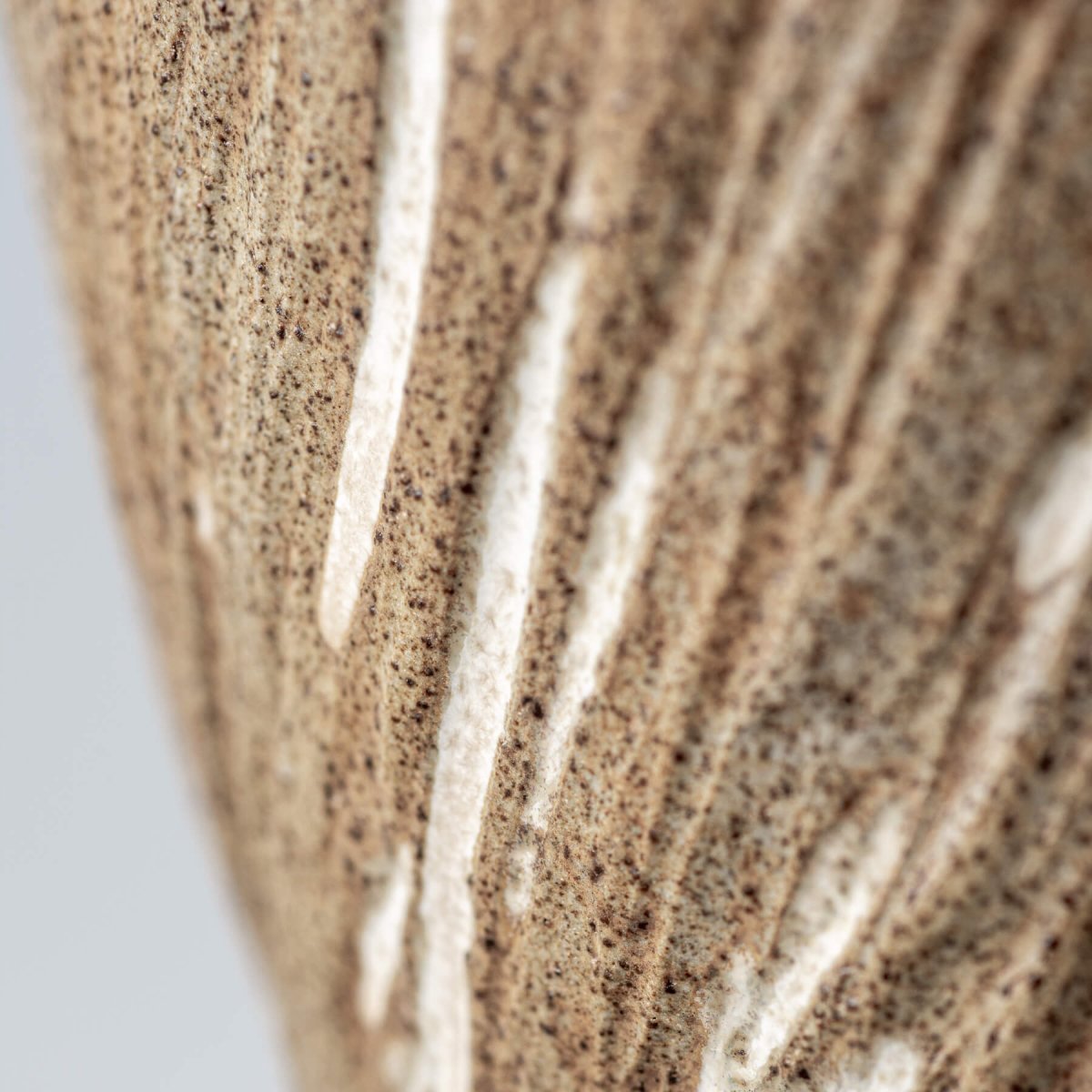 Artisanal ceramic espresso mug with natural clay texture and handmade glaze.