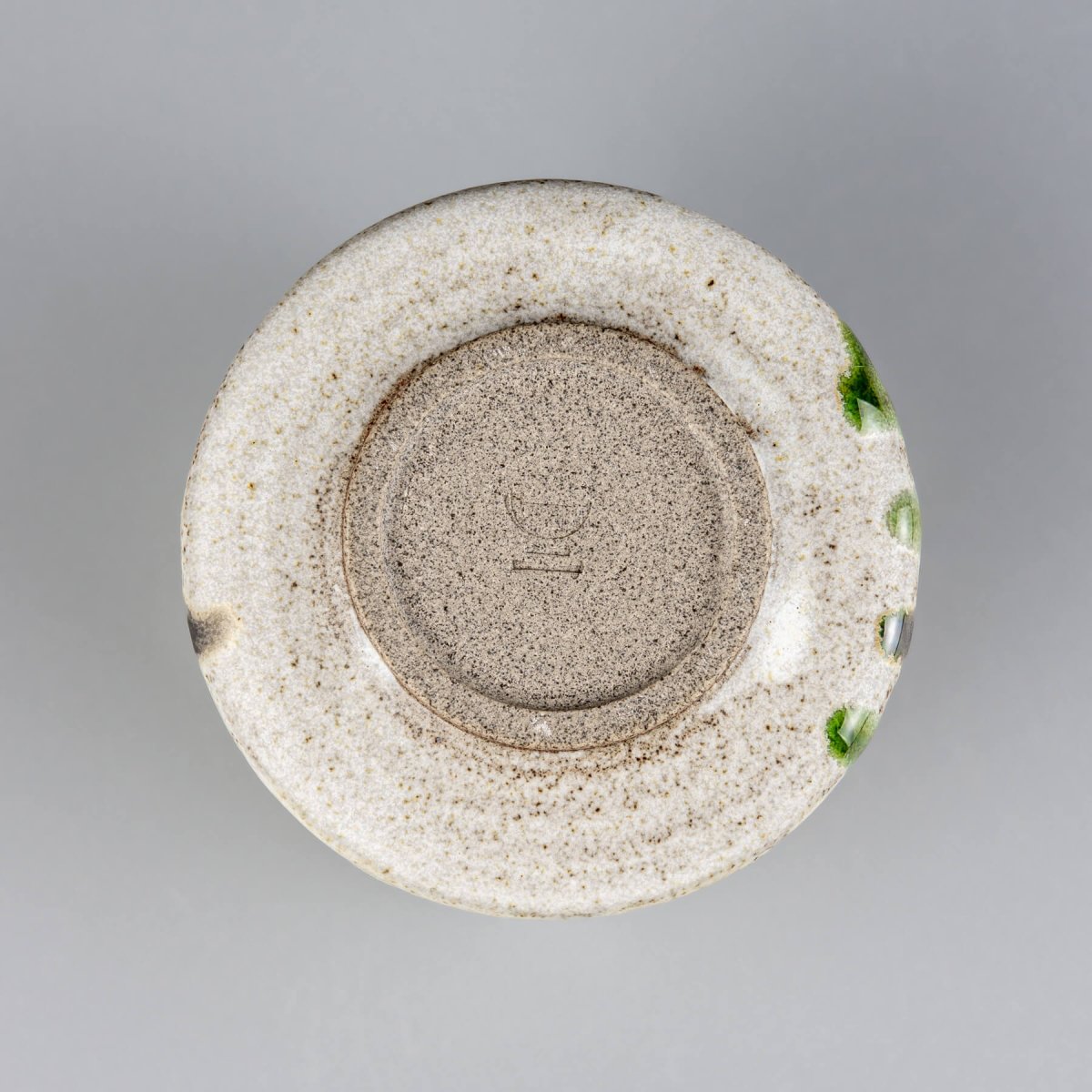 Stoneware kitchenware mug with a natural textured surface and luxury handmade decor.