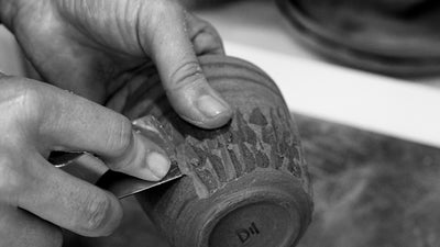 Svetlana Savcic handcrafting a ceramic cup – Stonessa handmade pottery process in a European artisan studio.